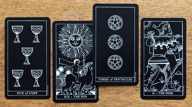 The Inversion Tarot in a Tin