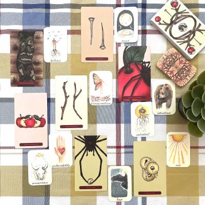 Cursed Auguries Tarot and Roots & Wings Mini Oracle