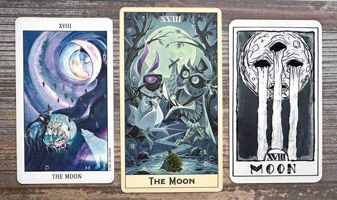 The Moon Card in the Tarot of the Spirit, Silver Acorn Tarot, and Umbral Embers Tarot