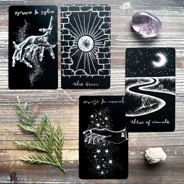 The Wandering Moon Tarot Midnight Sky Edition - Eight of Swords, The Sun, Three of Wands, Queen of Pentacles, Queen of Stars
