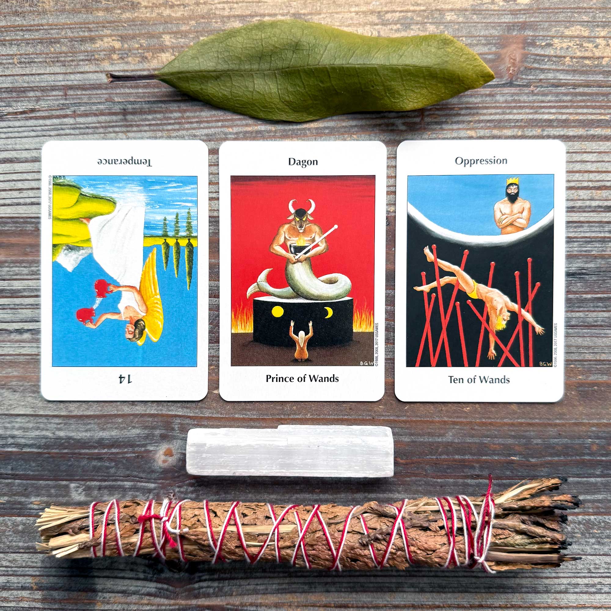 Barbara Walker Tarot in a Tin's Temperance card, Prince of Wands, and Ten of Wands