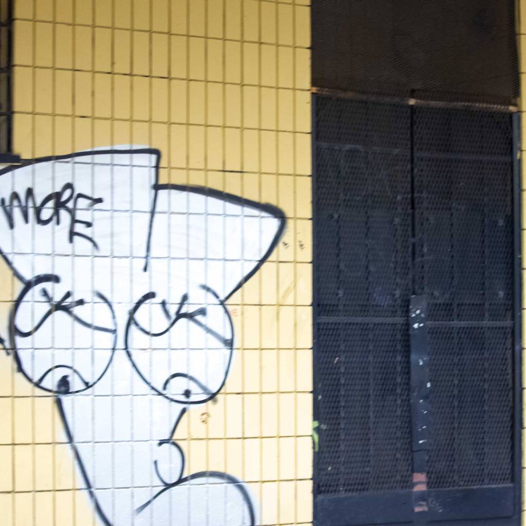 Graffiti in Yellow, White, and Black